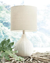 Set of two Ashley Furniture Rainermen table lamps with beige fabric shades and wooden bases, ideal for living room or bedside decor.