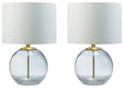 Ashley Furniture Samder table lamp set with two modern ceramic lamps featuring neutral gray shades and sleek bases.