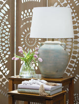 Shawburg table lamp set by Ashley Furniture featuring two elegant lamps with fabric shades and classic bases.