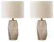 Ashley Furniture Taylor Lamp Set featuring two stylish table lamps with beige shades and decorative bases.