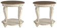 Set of two Ashley Furniture Realyn end tables with wooden tops and tapered legs, perfect for living room accents.