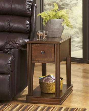Set of Ashley Furniture Breegin End Tables featuring modern wood finishes and sleek design, perfect for living room decor.