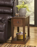 Set of Ashley Furniture Breegin End Tables featuring modern wood finishes and sleek design, perfect for living room decor.