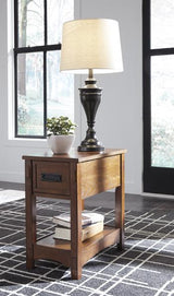 Ashley Furniture Breegin end table set showing two modern wooden tables with sleek design and dark finish.