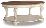 Ashley Furniture Realyn Table Set featuring a wooden dining table with matching chairs and decorative accents.