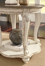 Ashley Furniture Realyn Table Set featuring a wooden dining table and matching chairs with a classic design.