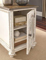 Realyn table set by Ashley Furniture featuring a wooden table with matching chairs in a modern dining room setting.