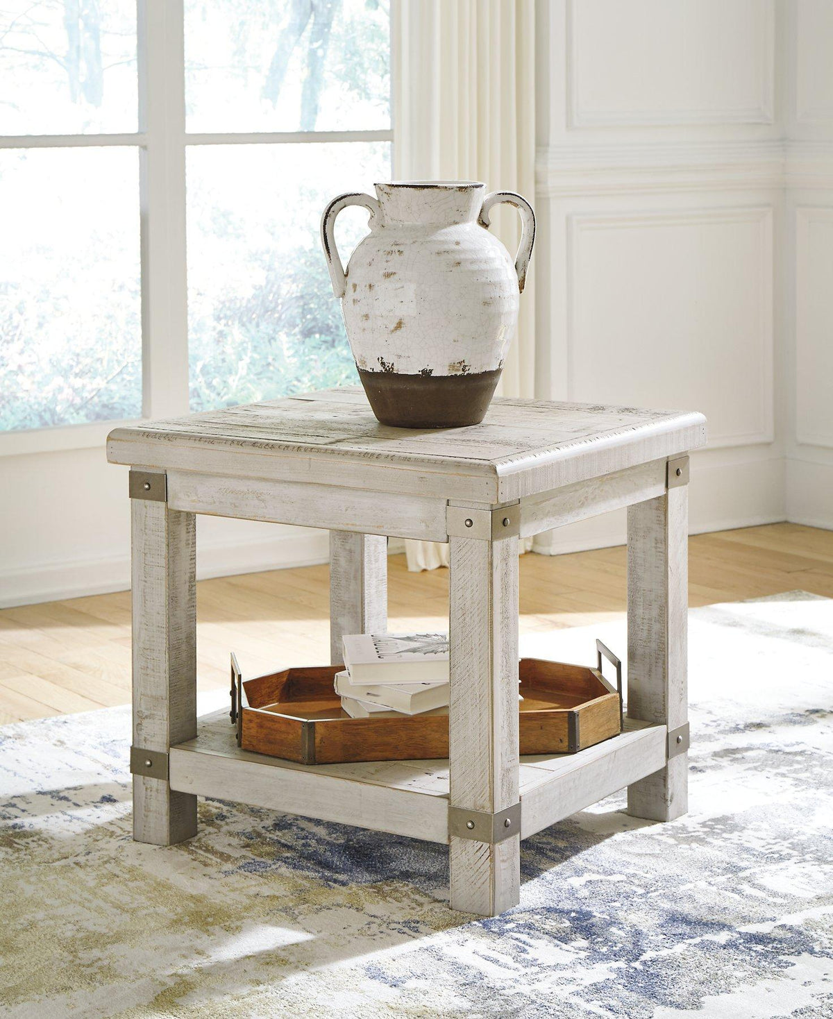 Ashley Furniture Carynhurst End Table Set featuring two elegant wooden tables with a classic design and warm finish.