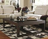 Ashley Furniture Watson Occasional Table Set featuring two stylish accent tables with sleek wood finishes and modern design.