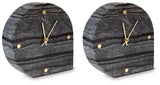 Two Ashley Furniture Janmour table clocks, stylish tabletop accessories with a modern design, displayed from an angled perspective.