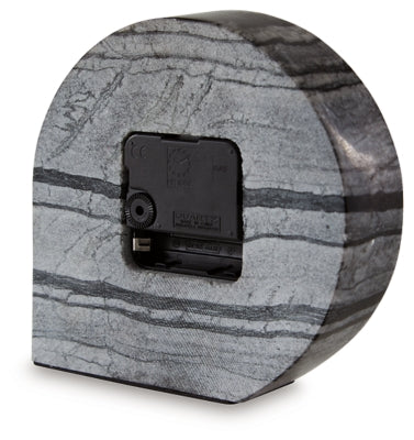 Set of two Janmour table clock accessories from Ashley Furniture, featuring sleek, modern designs for tabletop decor.