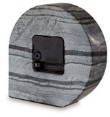 Set of two Janmour table clock accessories from Ashley Furniture, featuring sleek, modern designs for tabletop decor.