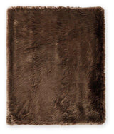 Set of three Ashley Furniture Bellethrone throws with soft fabric and decorative fringes, perfect for cozy living room decor.