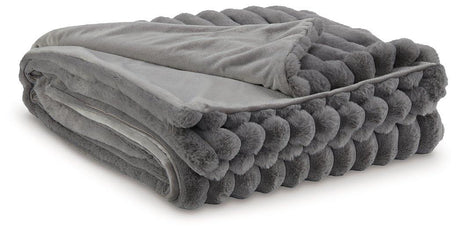 Set of three Ashley Furniture Alsonwell throws with soft, cozy fabric perfect for home decor and lounging.
