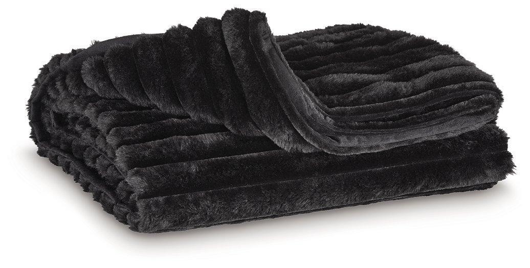 Set of three Ashley Furniture Alsonwell throws with soft, cozy fabric, neatly folded and stacked for display.