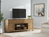 Ashley Furniture Sharlance 81-inch TV stand with open shelves and storage compartments in a modern design.