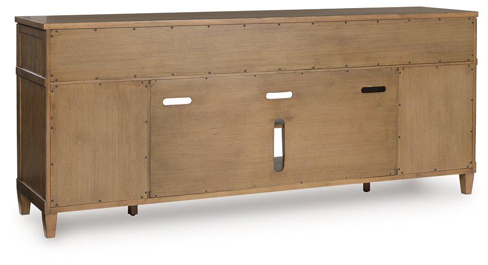 Ashley Furniture Sharlance 81-inch TV stand with open shelves and storage cabinets in a modern wood finish.