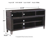 Ashley Furniture Todoe 65-inch TV stand with electric fireplace, featuring black finish and storage compartments.