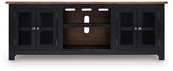 Wildenauer 76-inch TV stand by Ashley Furniture with a modern wooden design and multiple storage compartments.
