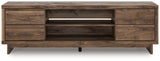 Ashley Furniture Zadilyn 72-inch TV stand with open shelves and storage compartments, finished in a warm wood tone.