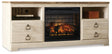 Willowton 64-inch TV stand with electric fireplace by Ashley Furniture, showcasing a modern design with open shelving and a cozy fire feature.