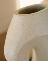 Ashley Furniture Odion vase with a sleek, modern design and textured finish, perfect for home decor accents.