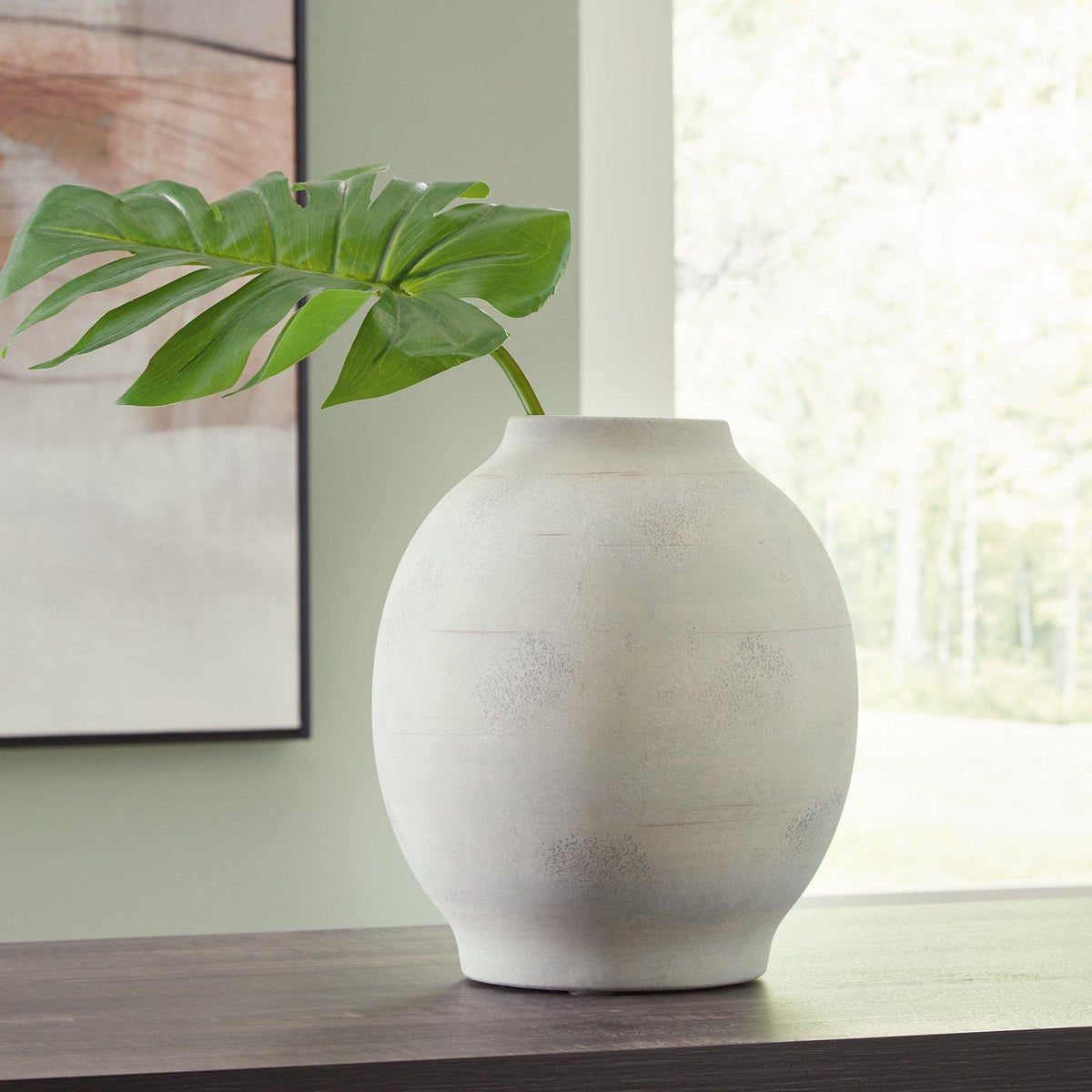 Elegant Clayson Vase by Ashley Furniture with a sleek design, perfect for decorative display in modern living spaces.