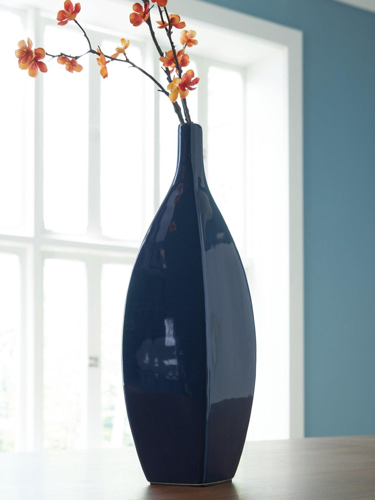 Elegant Ashley Furniture Abtinson Vase with a sleek, modern design, showcased on a neutral background.