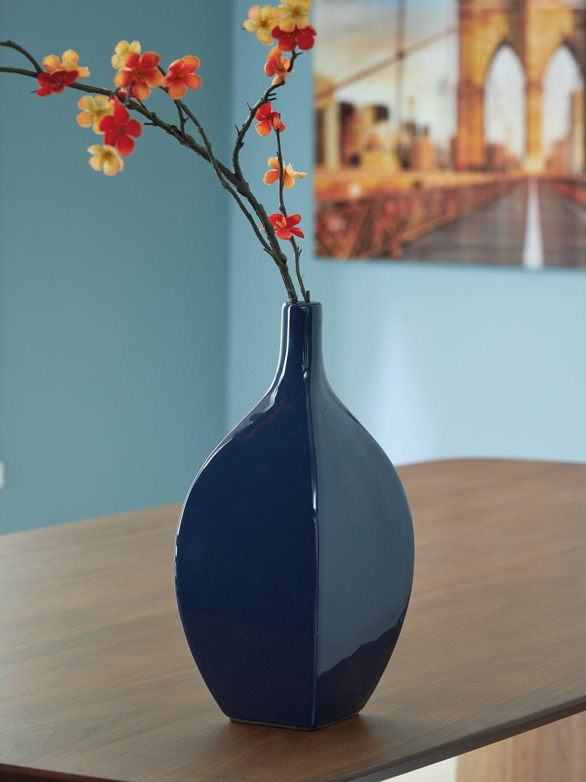 Elegant Abtinson Vase by Ashley Furniture featuring a sleek ceramic design with a glossy finish, ideal for decorative display.