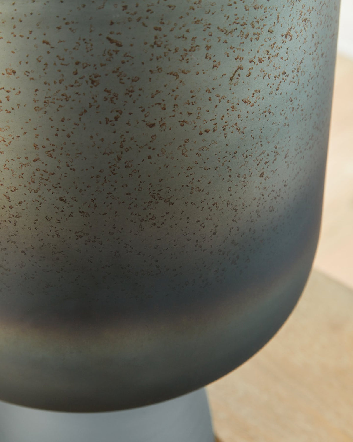 Ashley Furniture Pennmore Vase with intricate design, shown in a close-up image highlighting its detailed craftsmanship.