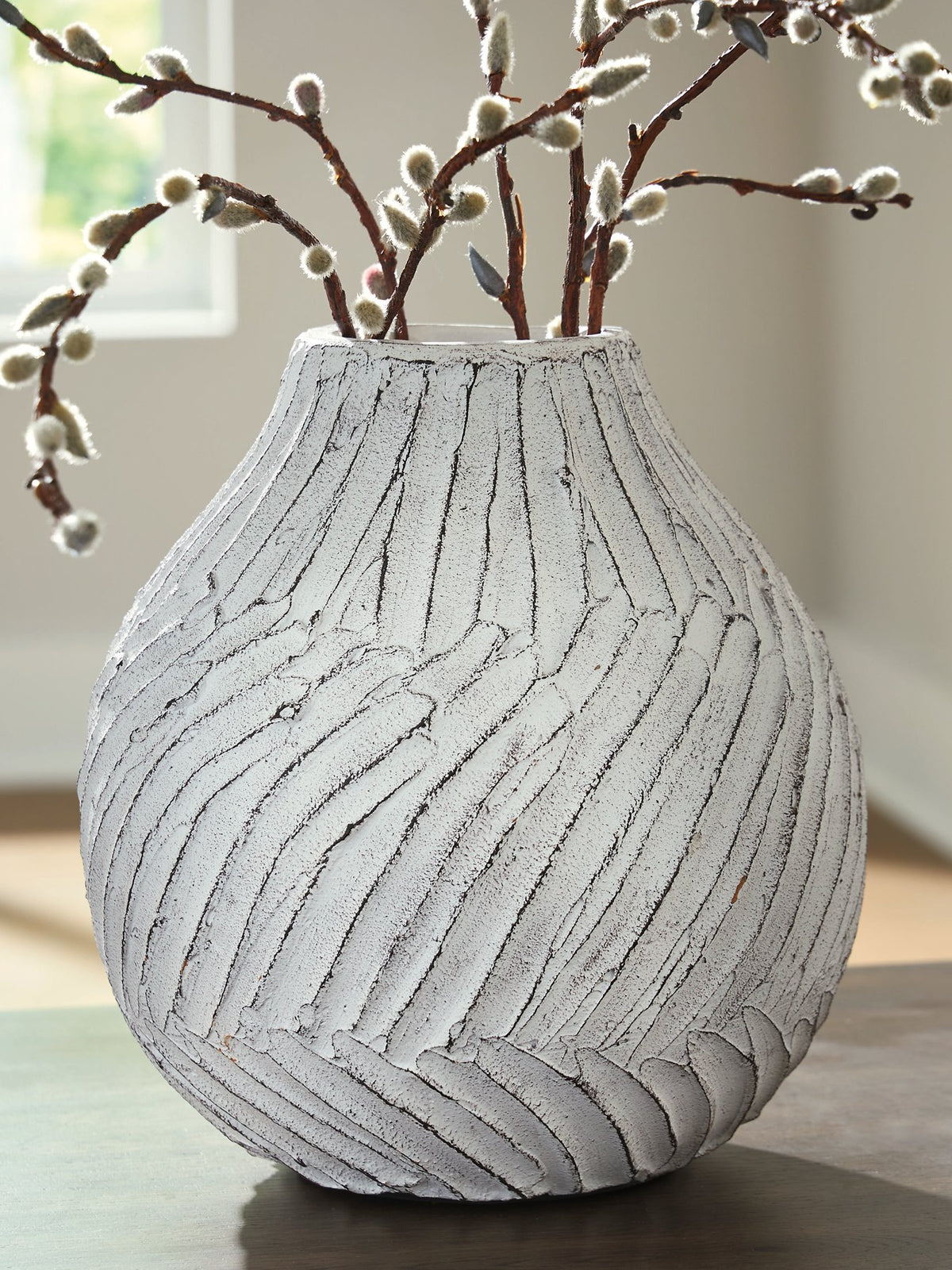Ashley Furniture Shelvie Vase featuring a sleek, modern design with a smooth finish, perfect for home decor.