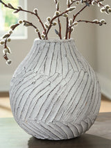 Ashley Furniture Shelvie Vase featuring a sleek, modern design with a smooth finish, perfect for home decor.