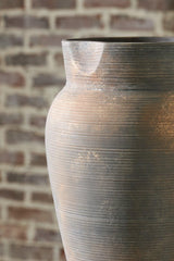 Ashley Furniture Brickmen Vase with a sleek ceramic design, showcasing a modern decorative vase in neutral tones.