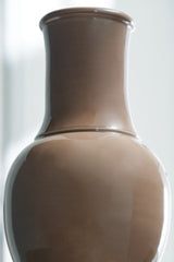 Ashley Furniture Tillmer Vase, decorative ceramic vase with a textured finish, shown in a close-up detail shot.