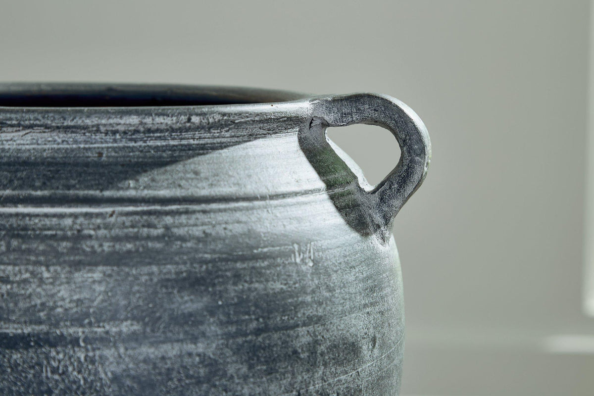 Ashley Furniture Meadie Vase, decorative ceramic vase with a sleek design, suitable for home decor or floral arrangements.
