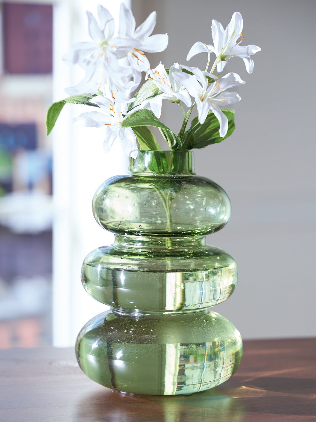 Ashley Furniture Renethorne vase with a sleek, modern design in a neutral finish, suitable for decorative display.