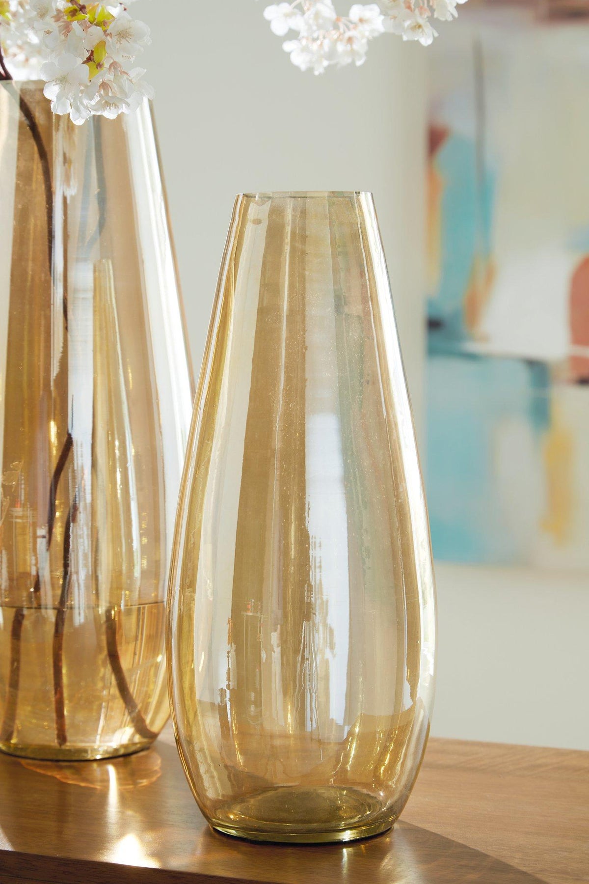 Elegant Rhettman Vase by Ashley Furniture, featuring a sleek design and neutral finish suitable for modern home decor.