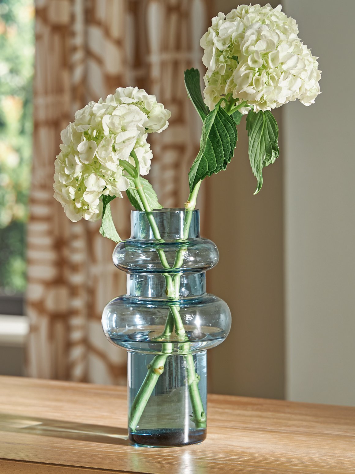 Ashley Furniture Vallmen Vase, decorative ceramic vase with a sleek design, shown on a neutral background.