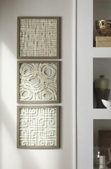 Set of three Ashley Furniture Odella Wall Decor pieces, modern wall art with textured designs for stylish interior accents.