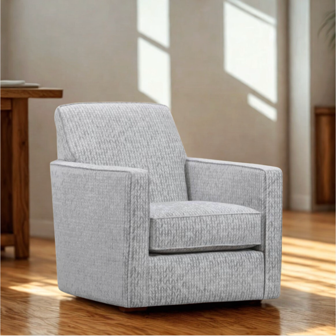 Behold Home Bayview Swivel Accent Chair with a modern design, featuring plush upholstery and a sleek swivel base.