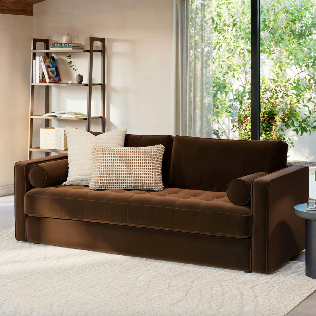 Brown velvet tufted sofa by Article featuring plush cushioning and modern design for stylish living room decor.