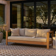 Outdoor sofa by Article, 80-inch Portside Beige outdoor sofa with plush cushions and modern design for patio or garden use.