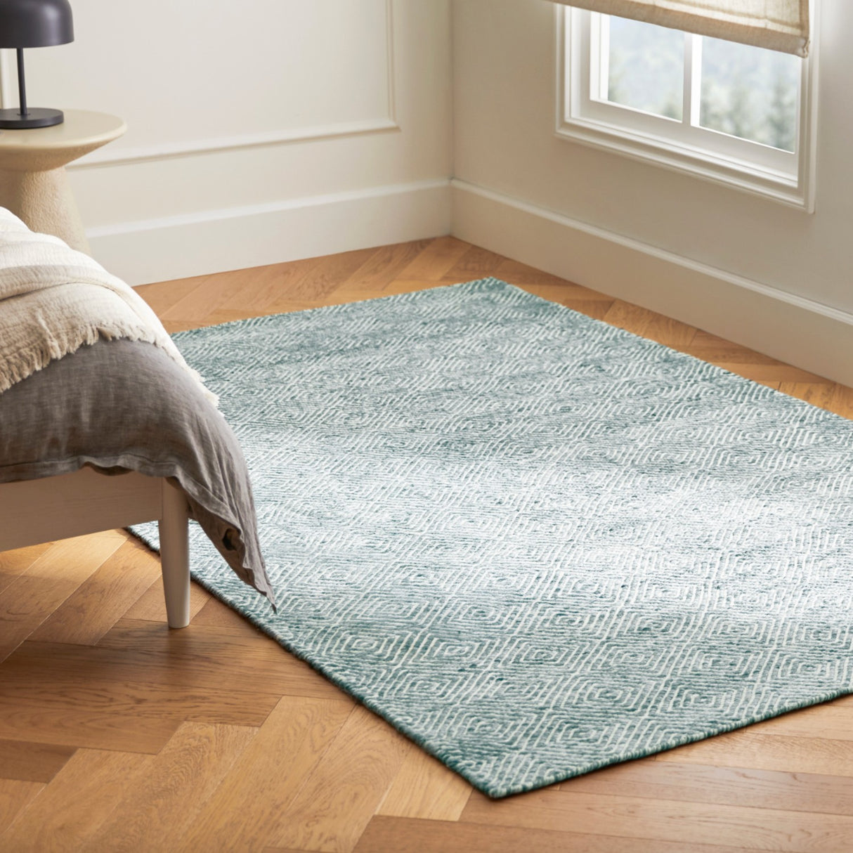 Medium-pile pearl blue rug by Article, 5' x 8' size, featuring soft textured surface and modern design.