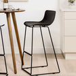 Black MCM indoor/outdoor barstool by Article with a sleek modern design and sturdy metal frame.