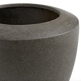 Large charcoal indoor/outdoor planter by Article, made of durable material, shown filled with lush green plants.