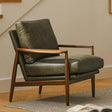 Green leather MCM chair by Article with sleek modern design and plush cushioning, perfect for stylish living spaces.