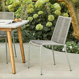 Heathered gray MCM dining chair by Article, stackable modern dining chair with sleek design and wooden legs.