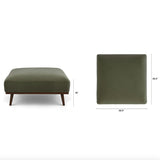 Felted green MCM-style square ottoman by Article with soft textured surface and sturdy wooden legs, modern accent piece.