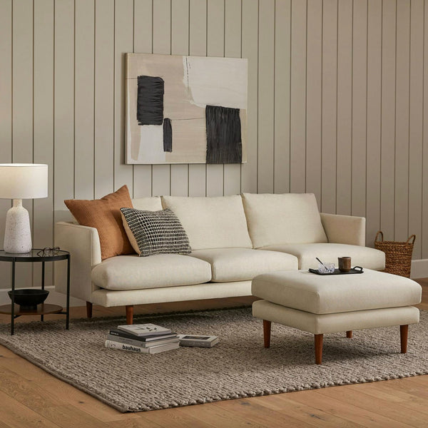 Article MCM Seasalt Ivory sofa and ottoman set with plush cushions and modern design, shown in a cozy living room setting.