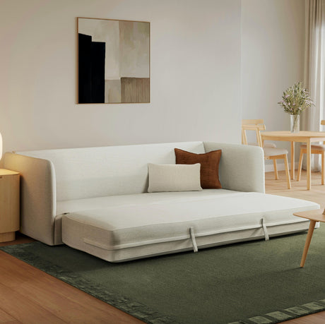 Harbor Ivory 88-inch Article sofa bed sleeper with plush cushions and modern design, shown in a stylish living room setting.